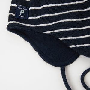 Merino Wool Navy Kids Bobble Hat from the Polarn O. Pyret outerwear collection. Ethically produced kids outerwear.