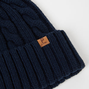 Wool Kids Navy Bobble Hat from the Polarn O. Pyret outerwear collection. Made using ethically sourced materials.