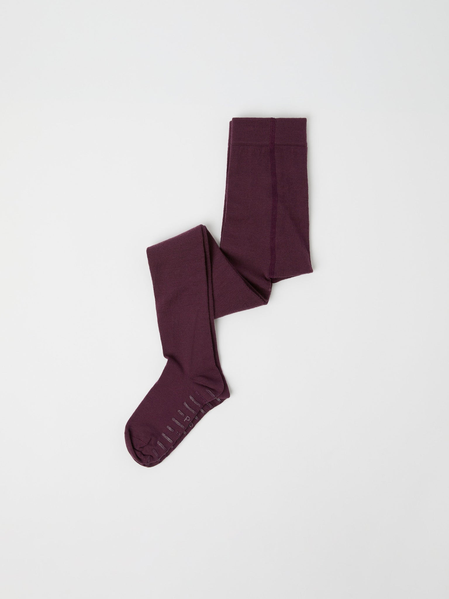 Burgundy Antislip Merino Kids Tights from Polarn O. Pyret kidswear. Clothes made using sustainably sourced materials.