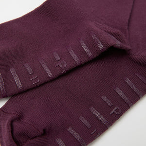 Burgundy Antislip Merino Kids Tights from Polarn O. Pyret kidswear. Clothes made using sustainably sourced materials.