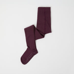 Burgundy Antislip Merino Kids Tights from Polarn O. Pyret kidswear. Clothes made using sustainably sourced materials.