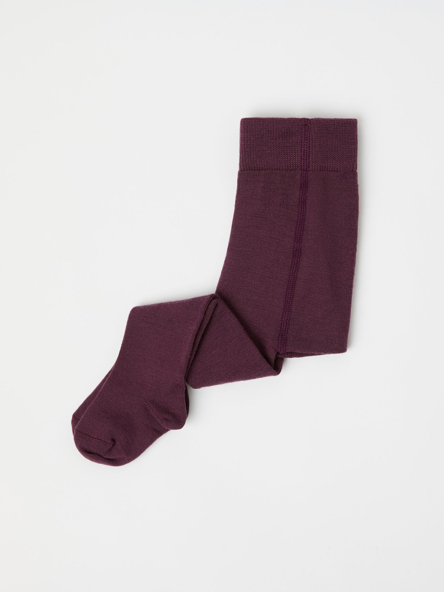 Burgundy Antislip Merino Kids Tights from Polarn O. Pyret kidswear. Clothes made using sustainably sourced materials.