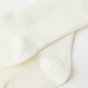 White Merino Baby Socks from the Polarn O. Pyret baby collection. The best ethical kids clothes