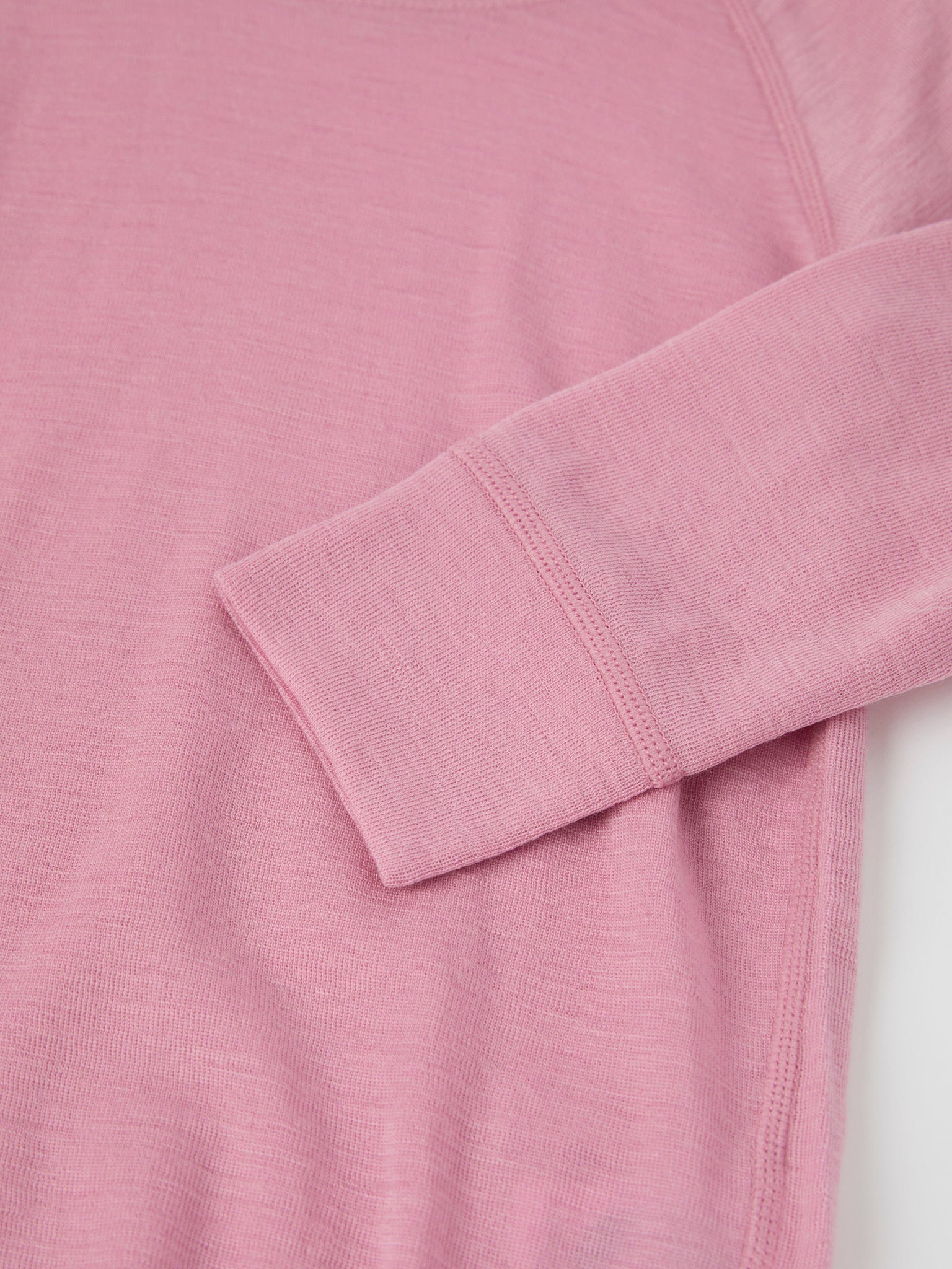 Pink Thermal Merino Wool Babygrow from the Polarn O. Pyret kidswear collection. The best ethical kids outerwear.