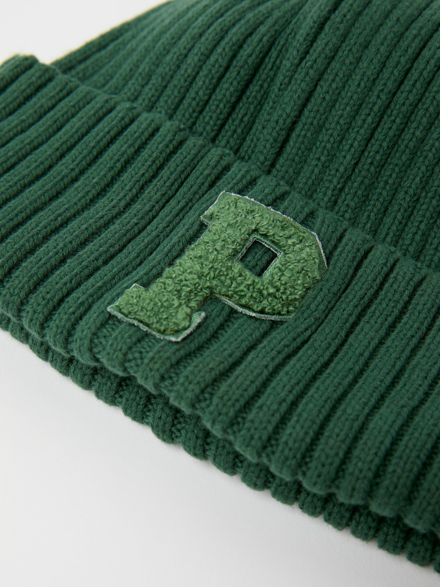 Green Rib Knit Kids Hat from the Polarn O. Pyret kidswear collection. Made using ethically sourced materials.