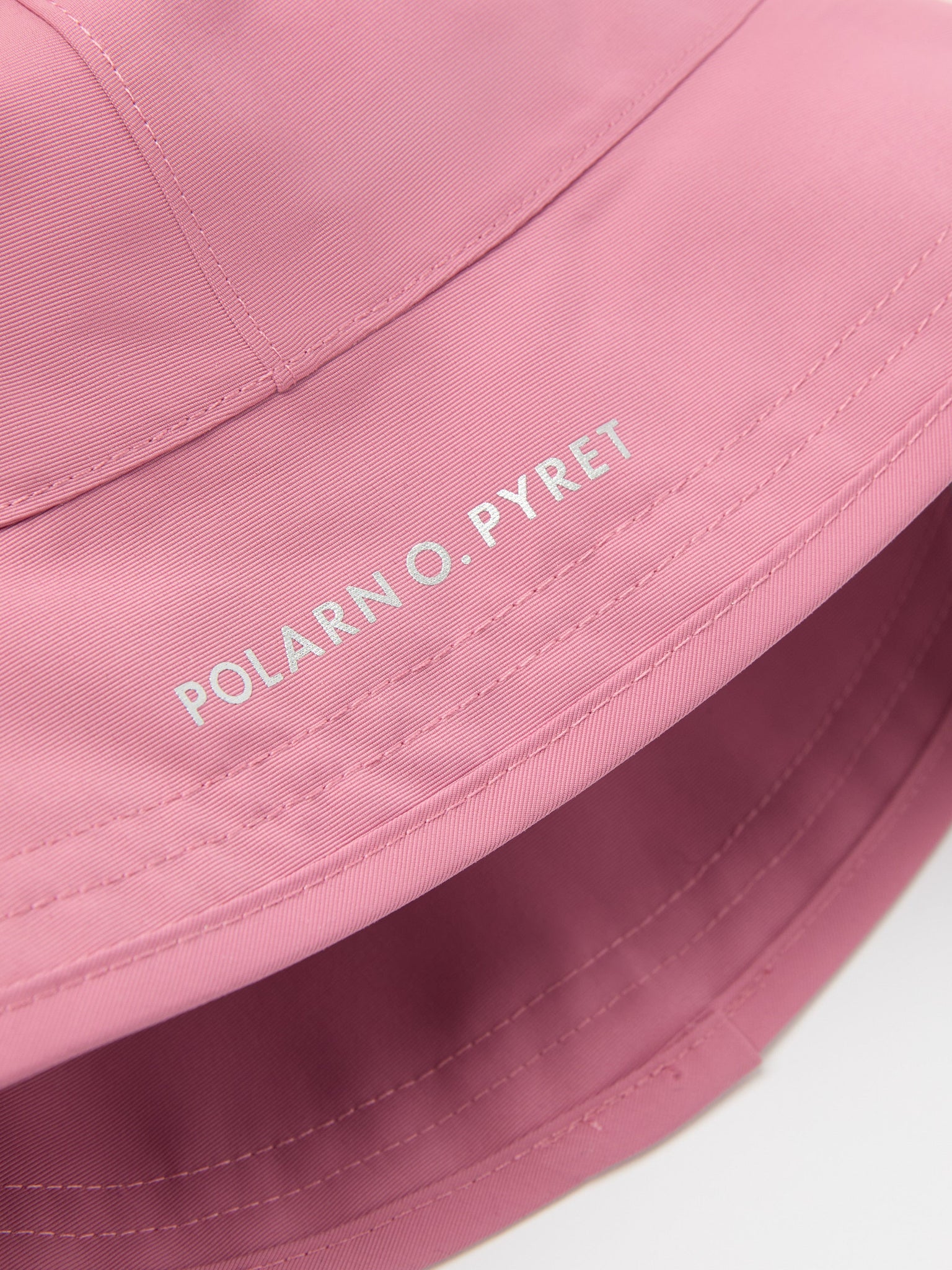 Pink Kids Waterproof Rain Hat from the Polarn O. Pyret kidswear collection. The best ethical kids outerwear.