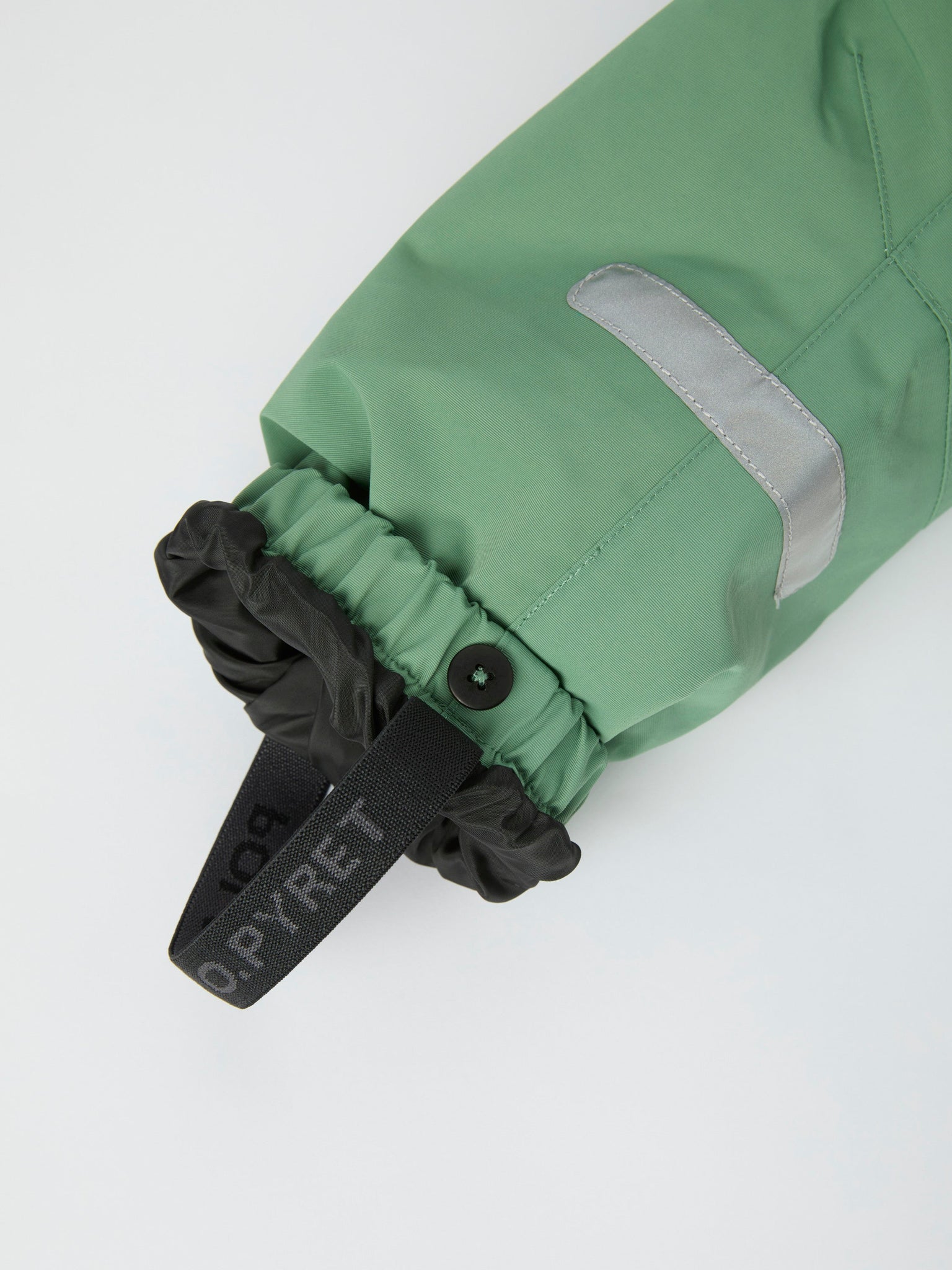 Green Waterproof Kids Shell Dungarees from the Polarn O. Pyret kidswear collection. The best ethical kids outerwear.