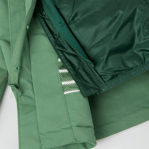 Waterproof Kids School Coat from the Polarn O. Pyret kidswear collection. The best ethical kids outerwear.