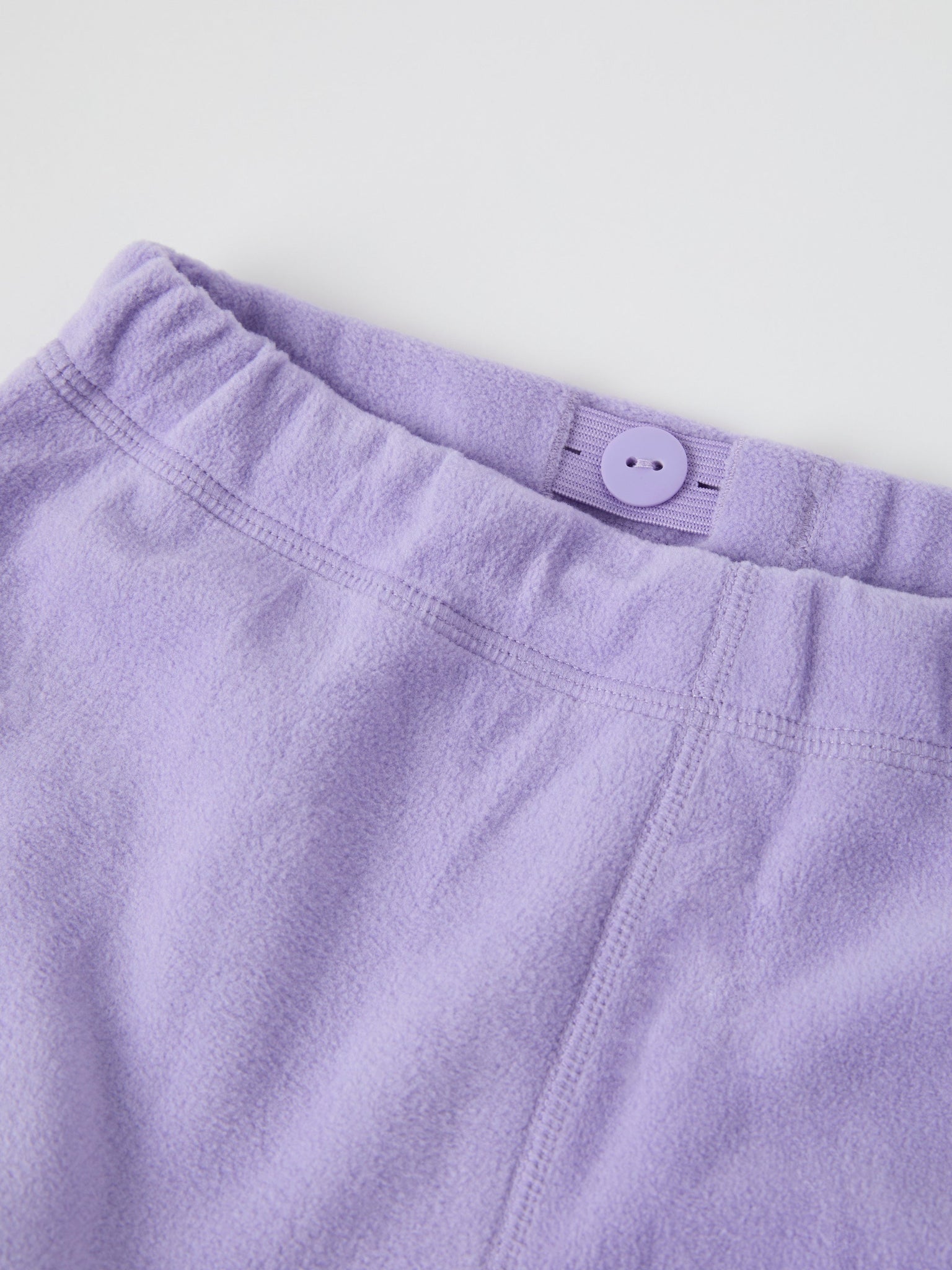 Purple Kids Thermal Fleece Trousers from the Polarn O. Pyret kidswear collection. The best ethical kids outerwear.