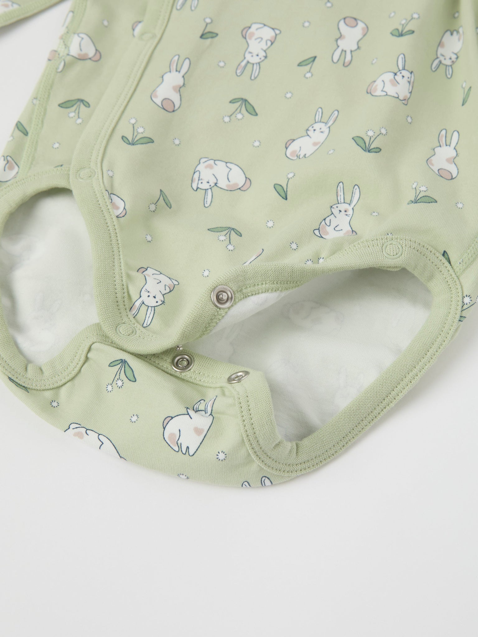 Bunny Print Wraparound Babygrow from the Polarn O. Pyret baby collection. Ethically produced kids clothing.