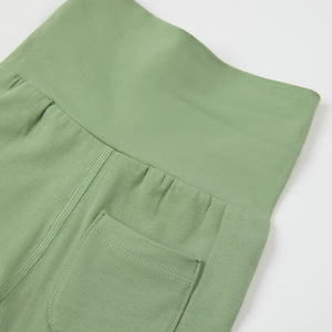 Green Cotton Baby Leggings from the Polarn O. Pyret baby collection. Nordic kids clothes made from sustainable sources.