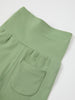 Green Cotton Baby Leggings from the Polarn O. Pyret baby collection. Nordic kids clothes made from sustainable sources.