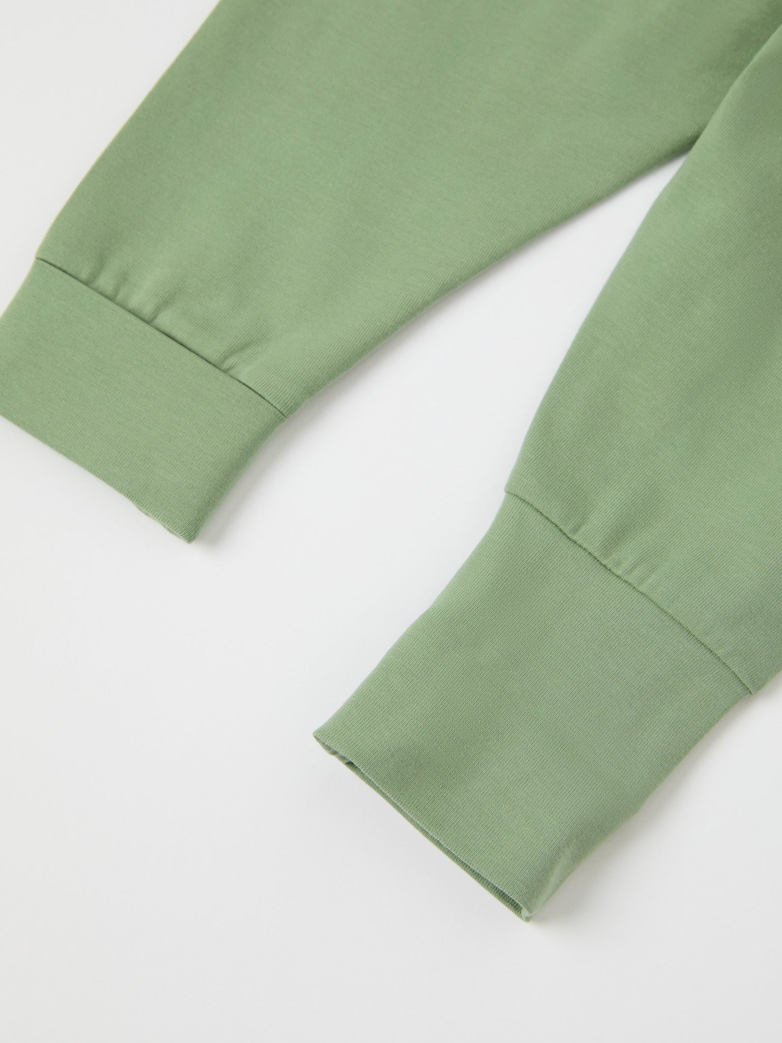 Green Cotton Baby Leggings from the Polarn O. Pyret baby collection. Nordic kids clothes made from sustainable sources.