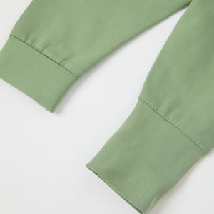 Green Cotton Baby Leggings from the Polarn O. Pyret baby collection. Nordic kids clothes made from sustainable sources.