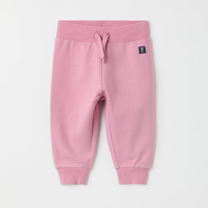 Pink Organic Cotton Baby Joggers from the Polarn O. Pyret baby collection. Nordic kids clothes made from sustainable sources.