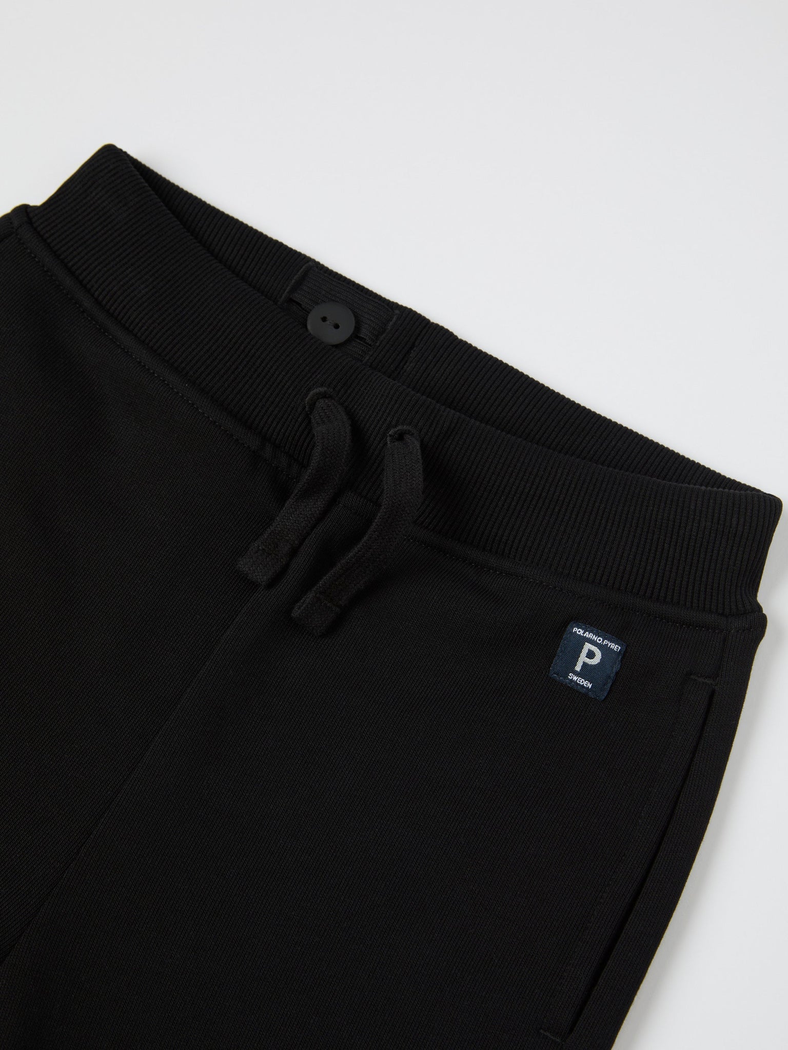 Black Organic Kids Joggers from Polarn O. Pyret kidswear. Nordic kids clothes made from sustainable sources.