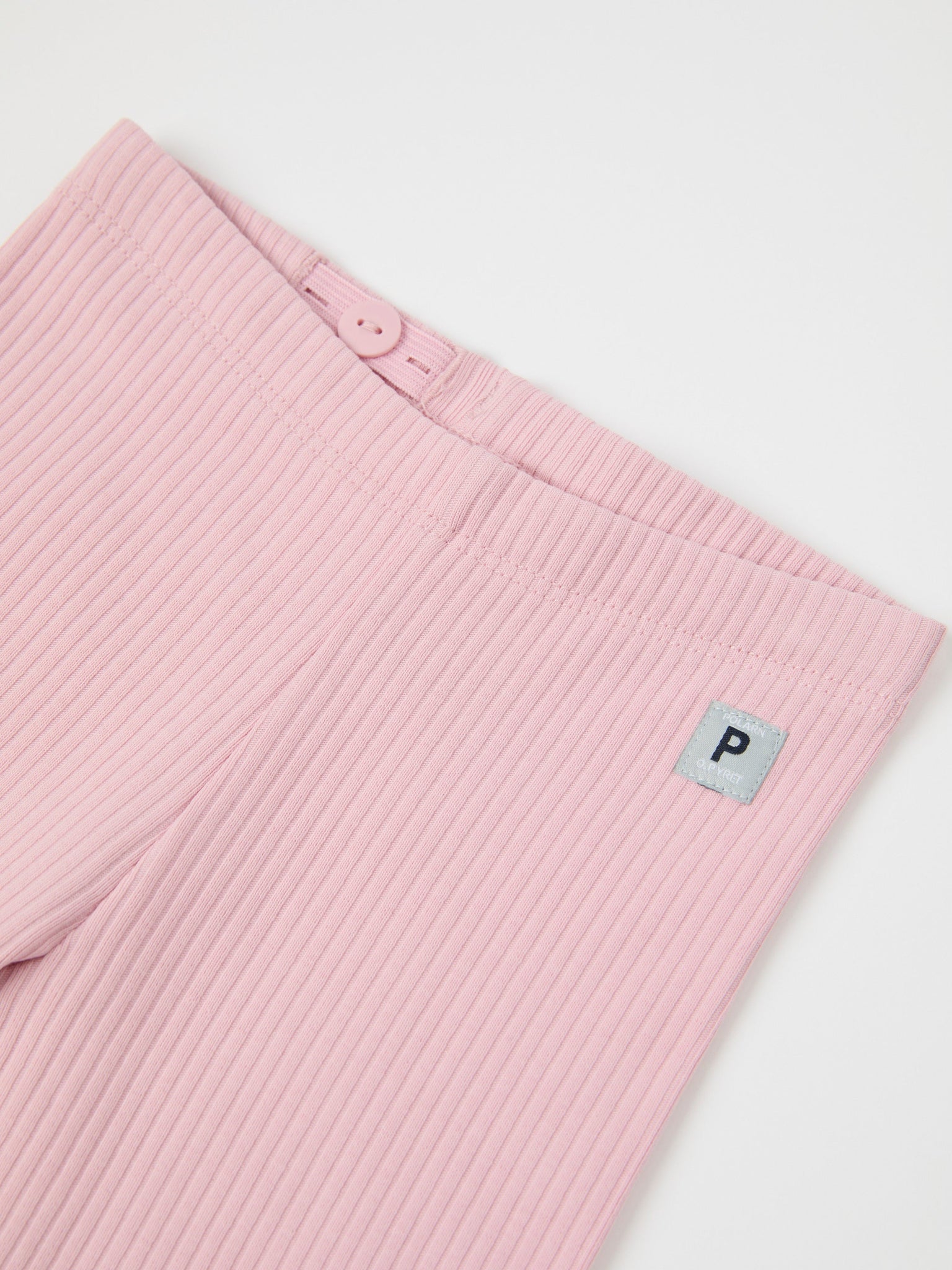 Pink Ribbed Baby Leggings from the Polarn O. Pyret baby collection. Clothes made using sustainably sourced materials.