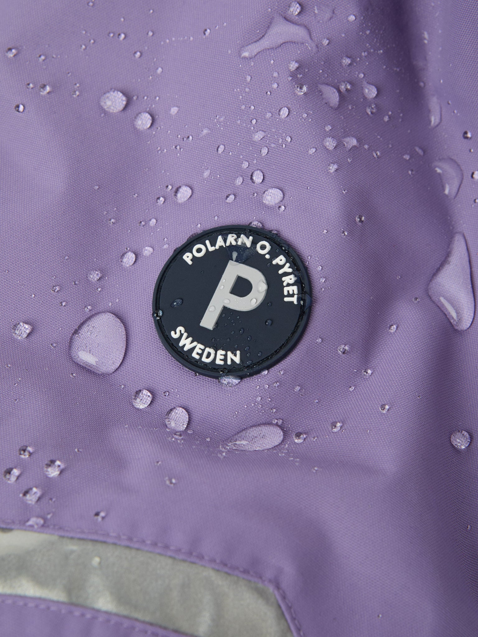 Purple Kids Padded Waterproof Coat from the Polarn O. Pyret kidswear collection. Ethically produced kids outerwear.