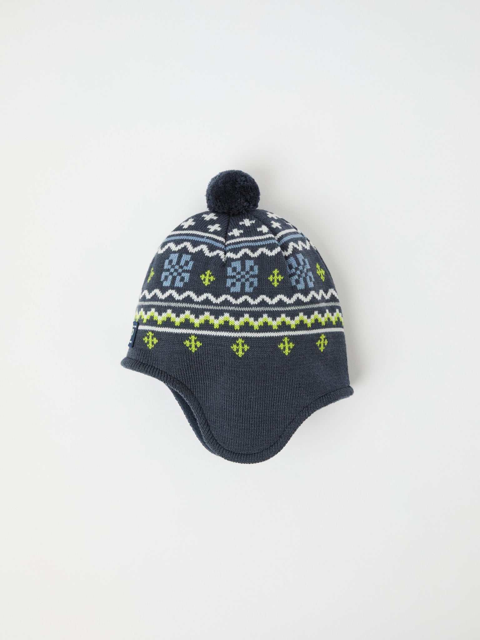 Blue Merino Wool Kids Bobble Hat from the Polarn O. Pyret kidswear collection. Made using ethically sourced materials.