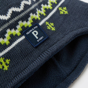 Blue Merino Wool Kids Bobble Hat from the Polarn O. Pyret kidswear collection. Made using ethically sourced materials.