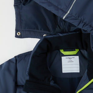 Navy Padded Water Resistant Kids Coat from the Polarn O. Pyret kidswear collection. The best ethical kids outerwear.