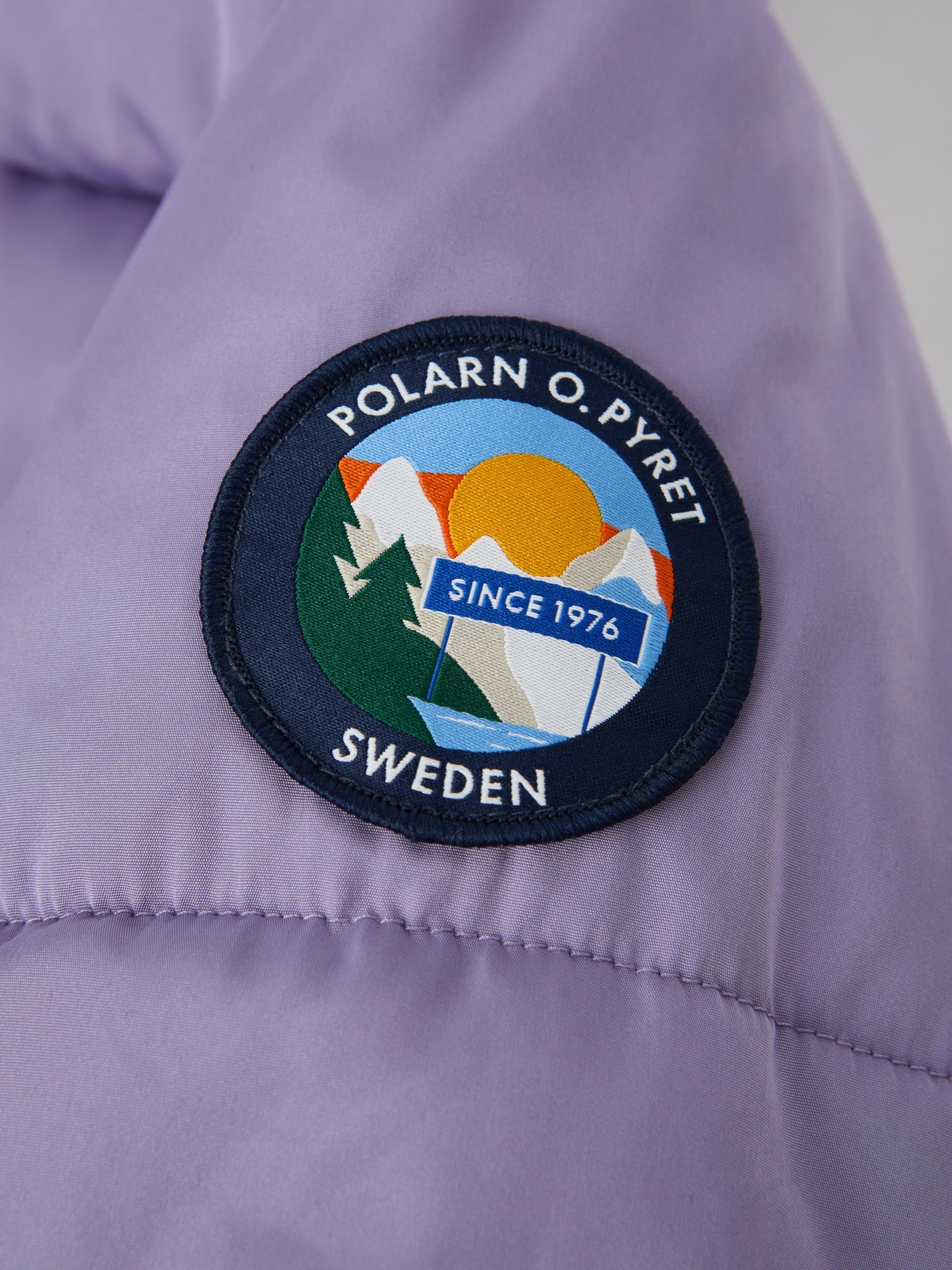 Purple Padded Water Resistant Kids Coat from the Polarn O. Pyret kidswear collection. Quality kids clothing made to last.