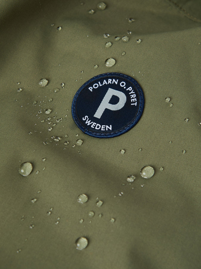 Green Recycled Kids Puddle Suit from the Polarn O. Pyret kidswear collection. Made using ethically sourced materials.