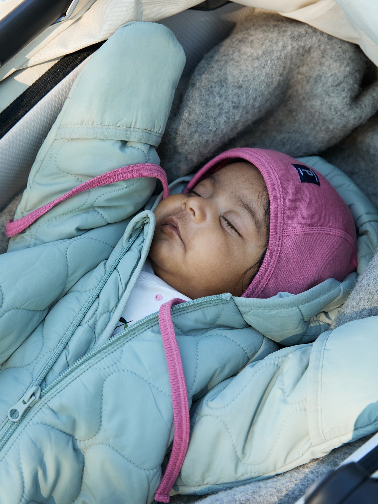 Pink Merino Wool Baby Helmet Hat from the Polarn O. Pyret kidswear collection. The best ethical kids outerwear.