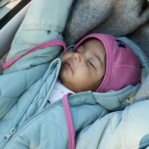 Pink Merino Wool Baby Helmet Hat from the Polarn O. Pyret kidswear collection. The best ethical kids outerwear.