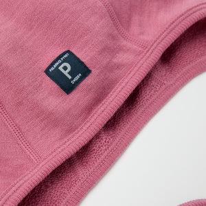 Pink Merino Wool Baby Helmet Hat from the Polarn O. Pyret kidswear collection. The best ethical kids outerwear.