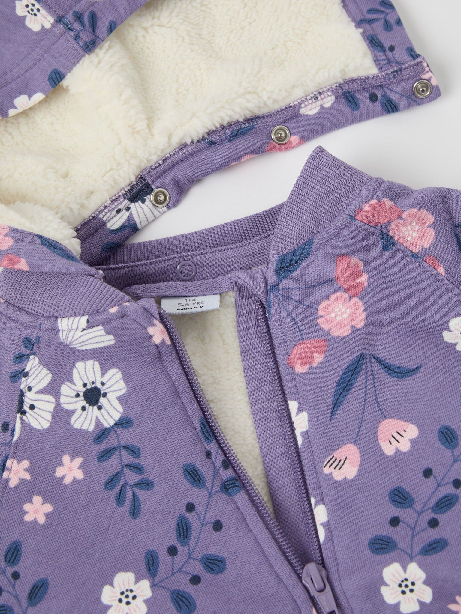 Fleece Lined Floral Kids Hoodie from the Polarn O. Pyret kidswear collection. The best ethical kids clothes