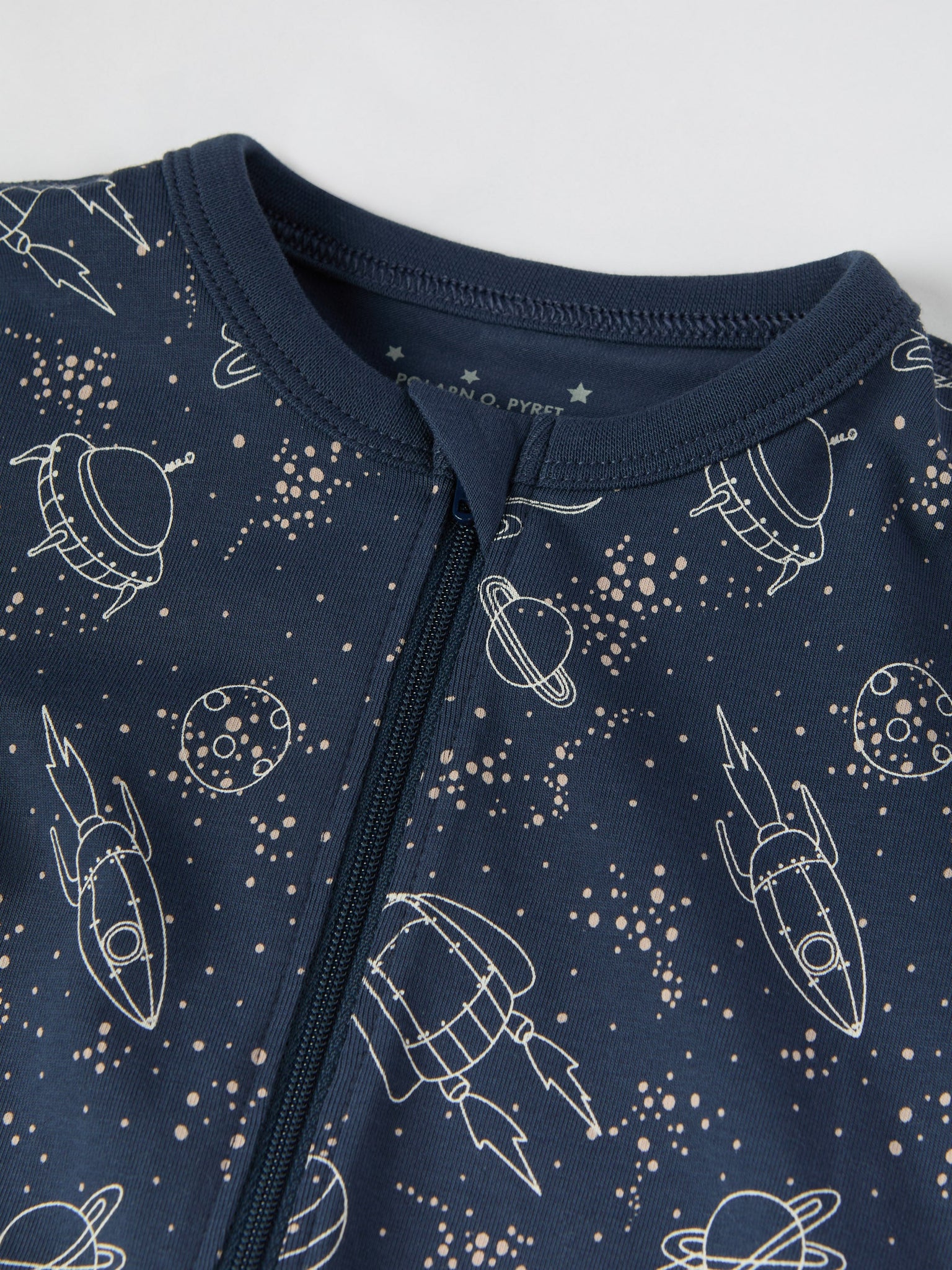 Space Print Baby Sleepsuit from the Polarn O. Pyret baby collection. Ethically produced kids clothing.