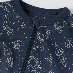 Space Print Baby Sleepsuit from the Polarn O. Pyret baby collection. Ethically produced kids clothing.