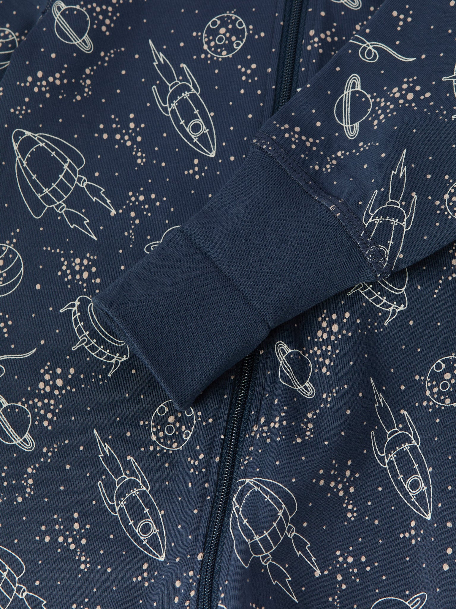 Space Print Baby Sleepsuit from the Polarn O. Pyret baby collection. Ethically produced kids clothing.