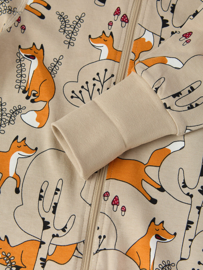 Fox Print Organic Cotton Baby Sleepsuit from the Polarn O. Pyret baby collection. Clothes made using sustainably sourced materials.