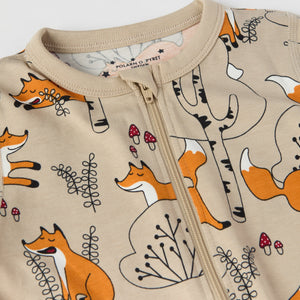 Fox Print Organic Cotton Baby Sleepsuit from the Polarn O. Pyret baby collection. Clothes made using sustainably sourced materials.