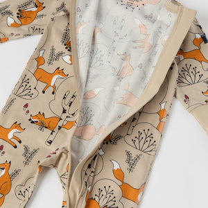 Fox Print Organic Cotton Baby Sleepsuit from the Polarn O. Pyret baby collection. Clothes made using sustainably sourced materials.