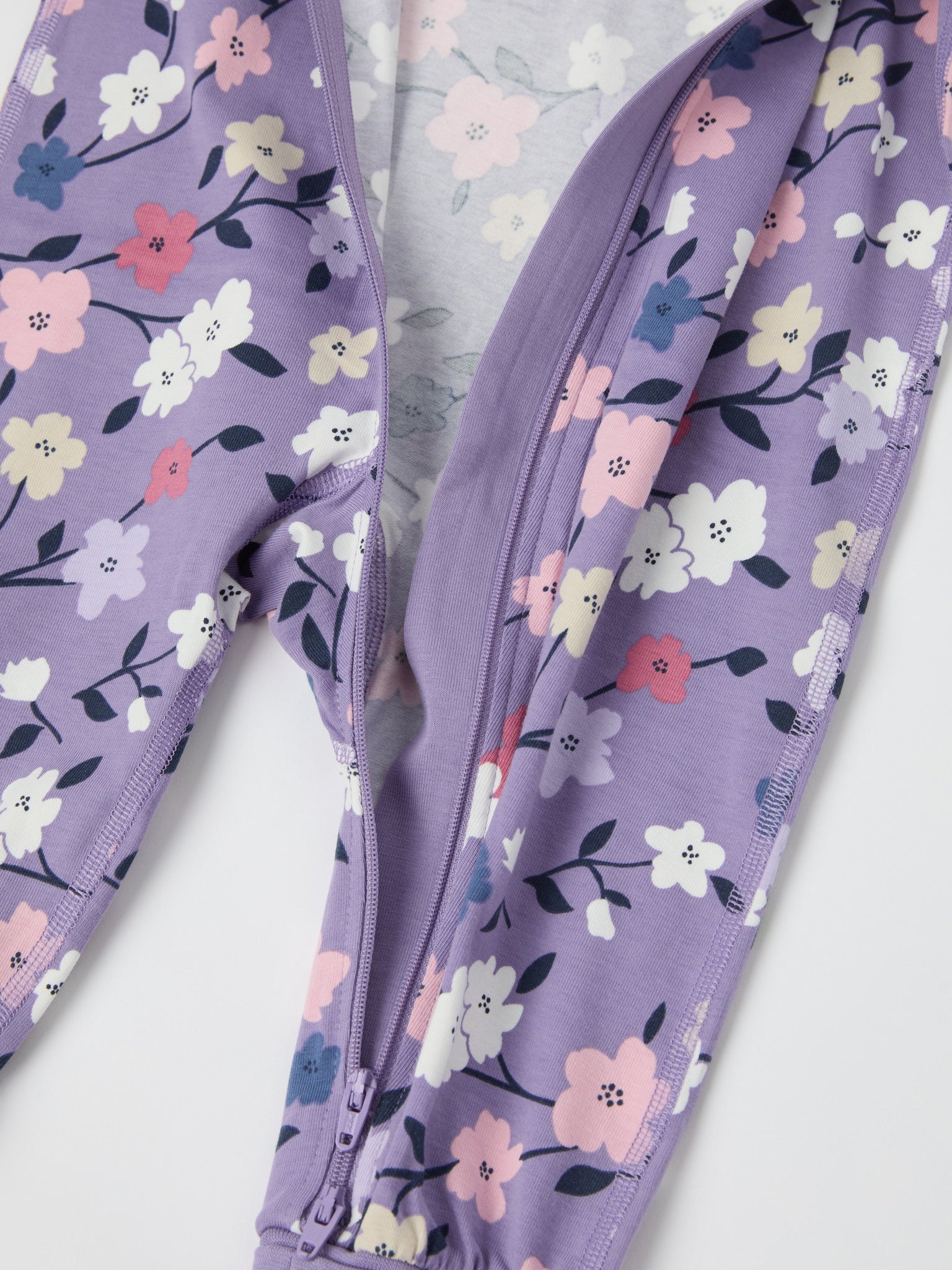 Floral Print Cotton Baby Sleepsuit from the Polarn O. Pyret baby collection. The best ethical kids clothes