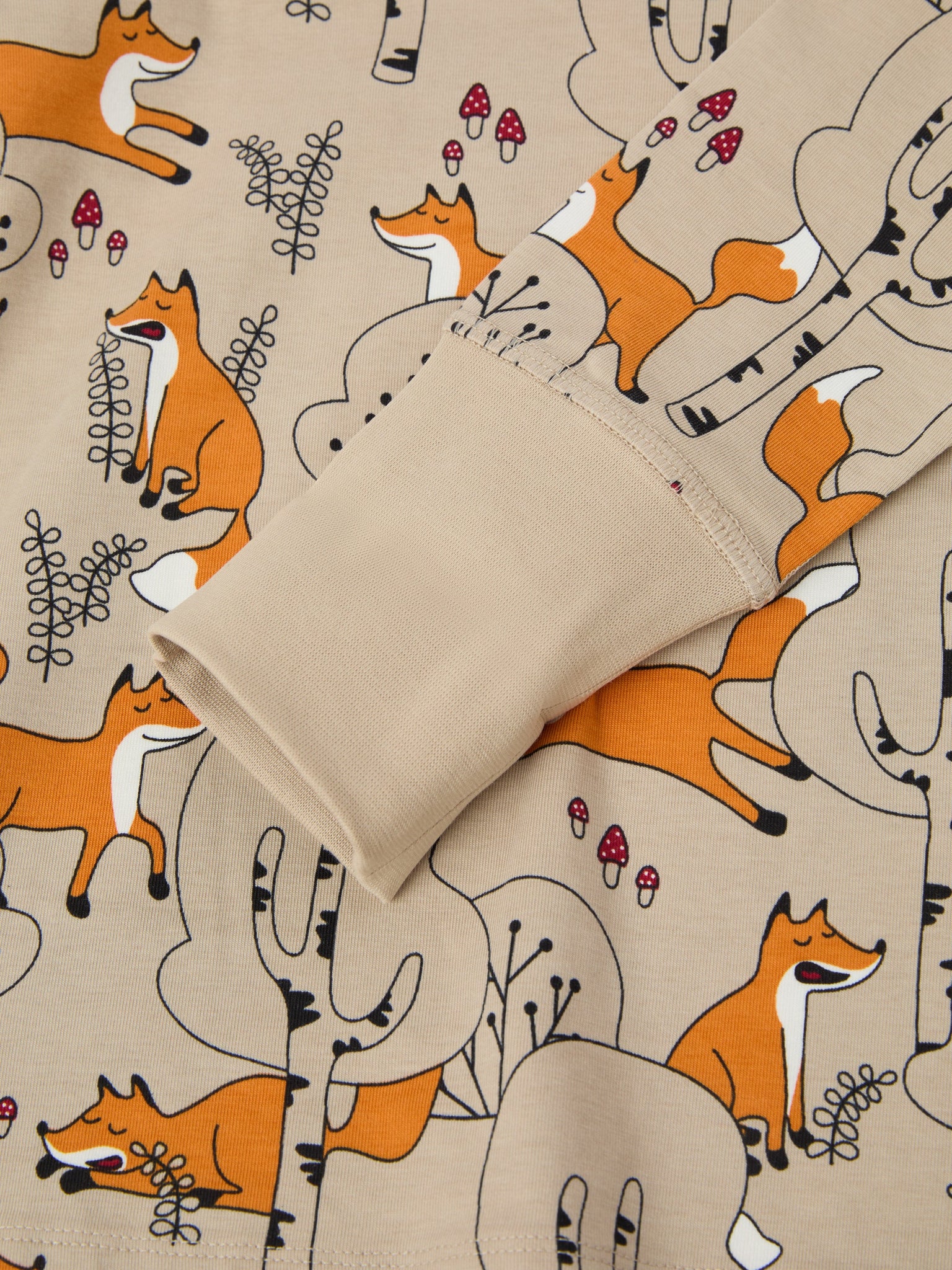 Fox Print Kids Pyjamas from the Polarn O. Pyret kidswear collection. Nordic kids clothes made from sustainable sources.