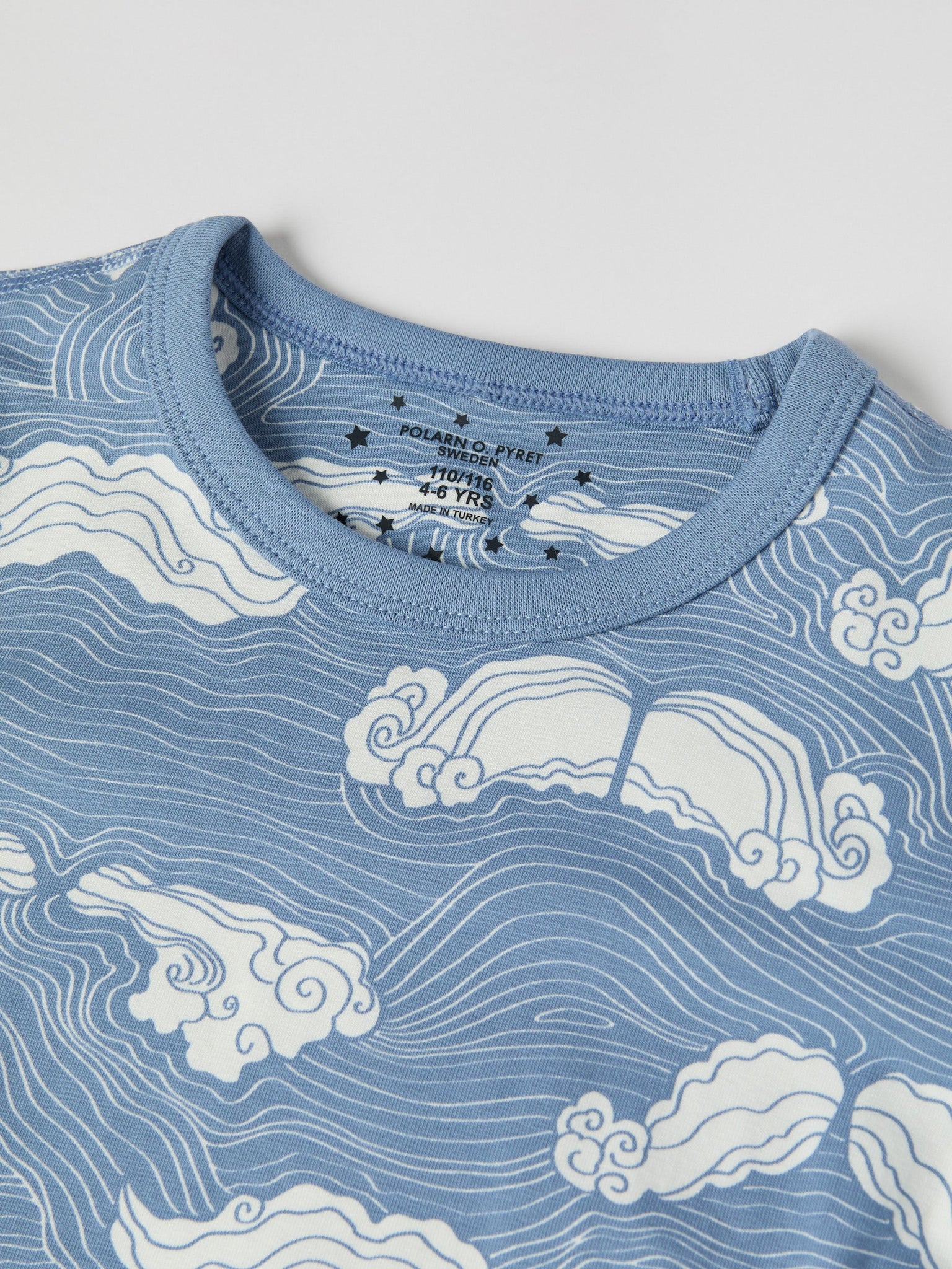 Mustache Print Kids Pyjamas from the Polarn O. Pyret kidswear collection. Clothes made using sustainably sourced materials.