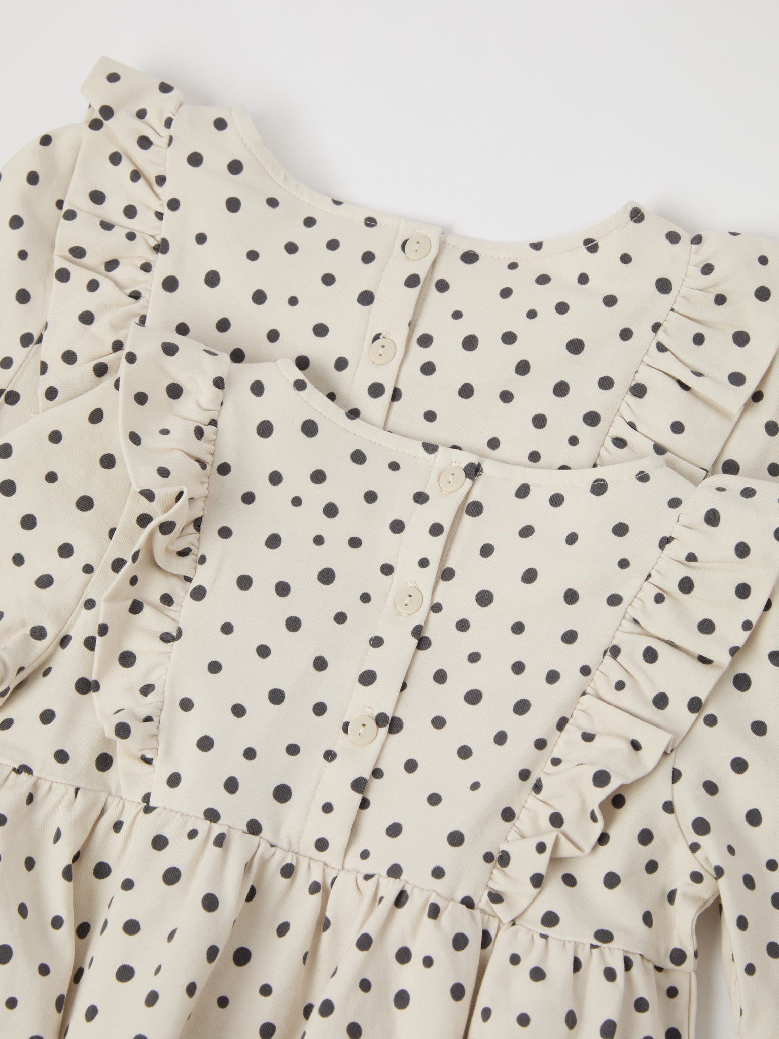 Organic Cotton Polka Dot Print Kids Dress from the Polarn O. Pyret kidswear collection. Ethically produced kids clothing.