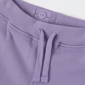 Purple Organic Cotton Kids Joggers from the Polarn O. Pyret kidswear collection. Nordic kids clothes made from sustainable sources.