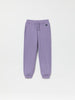 Purple Organic Cotton Kids Joggers from the Polarn O. Pyret kidswear collection. Nordic kids clothes made from sustainable sources.