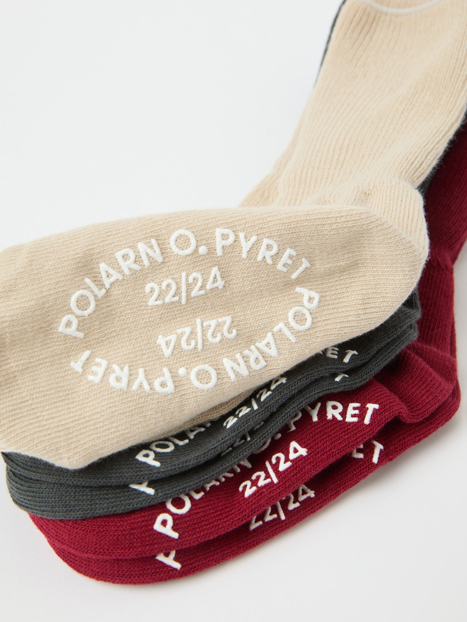 Three Pack organic Antislip Kids Socks from the Polarn O. Pyret kidswear collection. Clothes made using sustainably sourced materials.