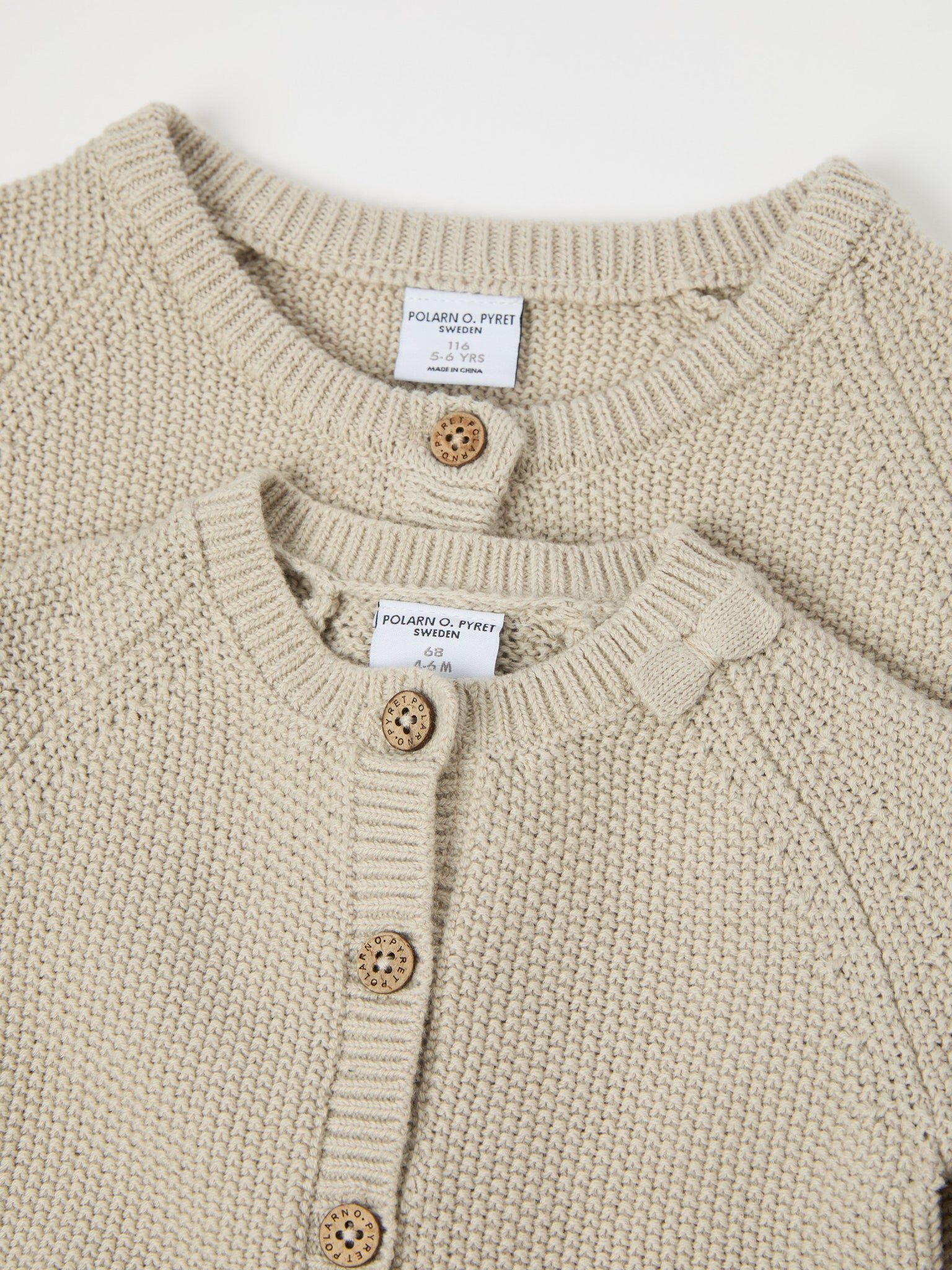 Beige Frilled Cotton Kids Cardigan from the Polarn O. Pyret kidswear collection. The best ethical kids clothes