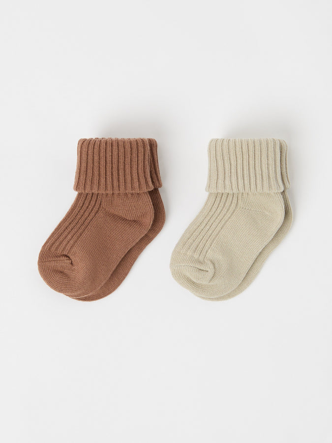 Beige Two Pack Baby Socks from the Polarn O. Pyret baby collection. Clothes made using sustainably sourced materials.