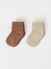 Beige Two Pack Baby Socks from the Polarn O. Pyret baby collection. Clothes made using sustainably sourced materials.