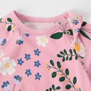 Floral Print Organic Babygrow from the Polarn O. Pyret baby collection. Clothes made using sustainably sourced materials.