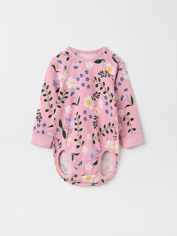 Floral Print Organic Babygrow from the Polarn O. Pyret baby collection. Clothes made using sustainably sourced materials.