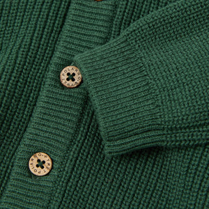 Green Cotton Knitted Baby Hoodie from the Polarn O. Pyret baby collection. Nordic kids clothes made from sustainable sources.